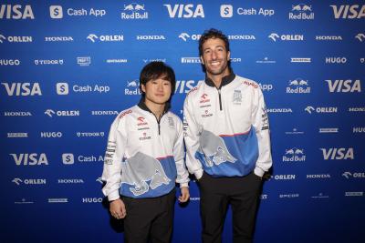 Yuki Tsunoda and Daniel Ricciardo pictured together at the launch of the Visa Cash App RB 2024 F1 car