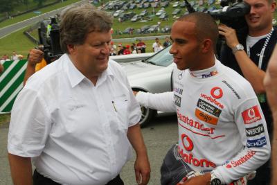 Norbert Haug pictured with Lewis Hamilton in 2008