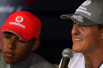 Lewis Hamilton sat alongside Michael Schumacher