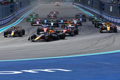 Sergio Perez and Max Verstappen came perilously close to contact at the start