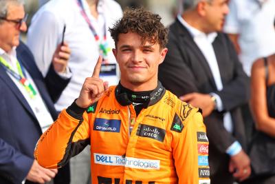 Lando Norris celebrates pole position 