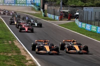 Oscar Piastri and Lando Norris do battle on the first lap