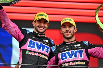 Esteban Ocon and Pierre Gasly celebrate on the podium