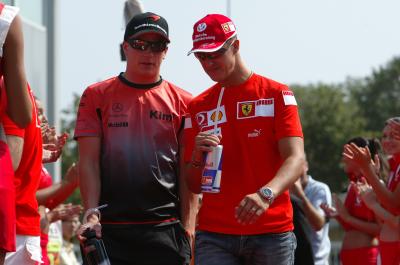 Kimi Raikkonen and Michael Schumacher