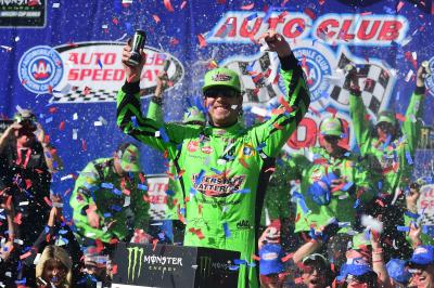 Kyle Busch overcomes speeding penalty to claim landmark win