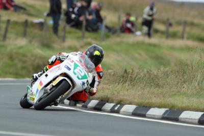 Classic TT: Anstey smashes lap and race records