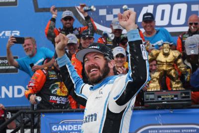 Martin Truex, Jr. surges from back to claim Dover win