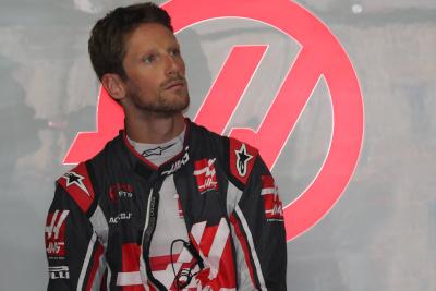 Kesalahan bendera biru membuat Grosjean kehilangan tiga poin dari larangan balapan F1