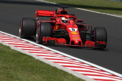 Vettel mengungguli pasangan Red Bull di FP2 Hongaria yang ketat