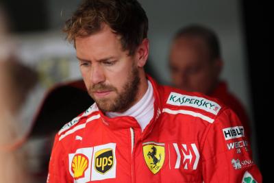 Vettel mendapat teguran dan denda € 25k untuk insiden jembatan timbang Brasil