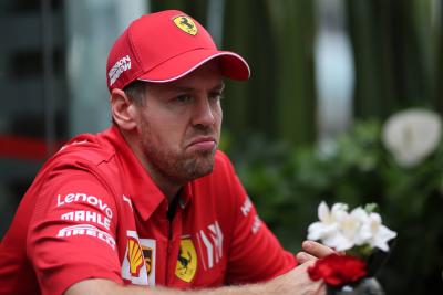 Vettel menanggapi klaim cheat Ferrari Verstappen