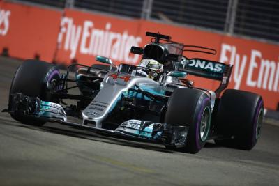 Hamilton takes crucial Singapore win as Vettel crashes out