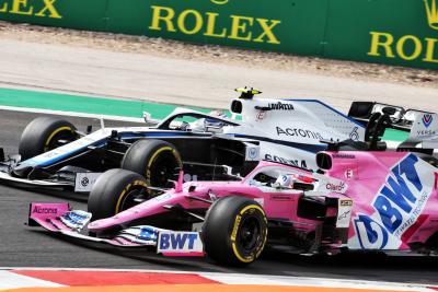 Sergio Perez (MEX) Racing Point F1 Team RP19 and Nicholas Latifi (CDN) Williams Racing FW43 battle for position.