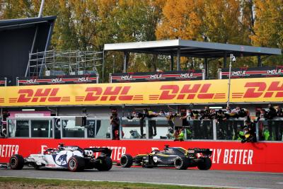 Daniel Ricciardo (AUS) Renault F1 Team RS20 celebrates his third position at the end of the race as he passes the team with fourth placed Daniil Kvyat (RUS) AlphaTauri AT01 passing him.