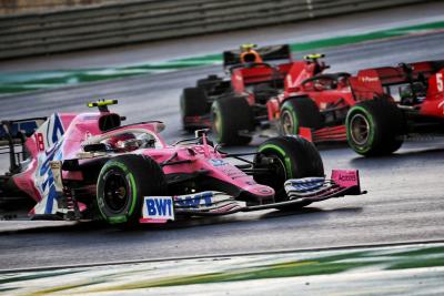 Lance Stroll (CDN) Racing Point F1 Team RP20 and Sebastian Vettel (GER) Ferrari SF1000 battle for position.