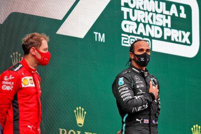 Race winner and World Champion Lewis Hamilton (GBR) Mercedes AMG F1 celebrates on the podium.