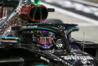 Lewis Hamilton (GBR) Mercedes AMG F1 W11 celebrates his pole position in qualifying parc ferme.