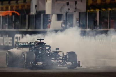 Lewis Hamilton (GBR) Mercedes AMG F1 W11 - doughnuts at the end of the race.