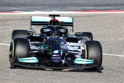 Lewis Hamilton (GBR) Mercedes AMG F1 W12 running flow-vis paint.