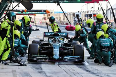 Sebastian Vettel (GER) Aston Martin F1 Team AMR21 practices a pit stop.