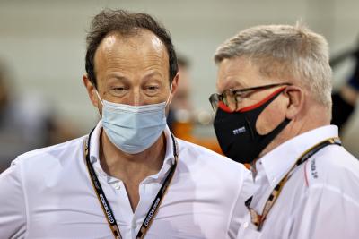 (L to R): Peter Bayer, FIA Secretary General for Motor Sport with Ross Brawn (GBR) Managing Director, Motor Sports on the grid.