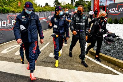 (L to R): Max Verstappen (NLD) Red Bull Racing with Sergio Perez (MEX) Red Bull Racing; Lewis Hamilton (GBR) Mercedes AMG F1; and Angela Cullen (NZL) Mercedes AMG F1 Physiotherapist.