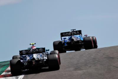 George Russell (GBR) Williams Racing FW43B leads Valtteri Bottas (FIN) Mercedes AMG F1 W12.