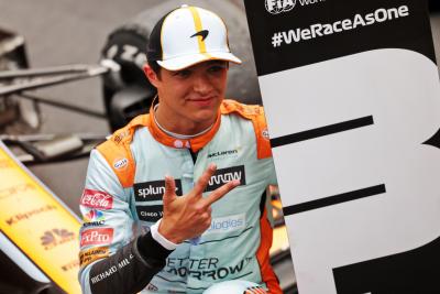 Lando Norris (GBR) McLaren celebrates his third position in parc ferme.