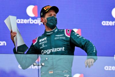 Sebastian Vettel (GER) Aston Martin F1 Team celebrates his second position on the podium.