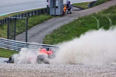 Sergio Perez (MEX) Red Bull Racing RB16B runs wide.