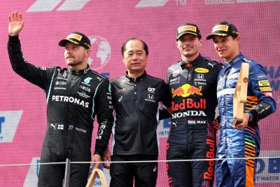 1st place Max Verstappen (NLD) Red Bull Racing RB16B, 2nd place Valtteri Bottas (FIN) Mercedes AMG F1 W12, 3rd place Lando Norris (GBR) McLaren MCL35M with Toyoharu Tanabe (JPN) Honda Racing F1 Technical Director.