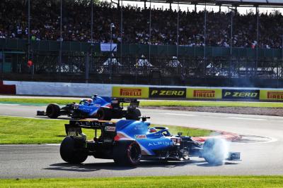 Fernando Alonso (ESP) Alpine F1 Team A521 follows team mate Esteban Ocon (FRA) Alpine F1 Team A521.