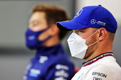 Valtteri Bottas (FIN) Mercedes AMG F1 and George Russell (GBR) Williams Racing in the FIA Press Conference.