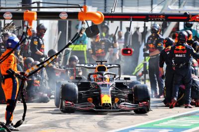 Max Verstappen (NLD) Red Bull Racing RB16B makes a pit stop.