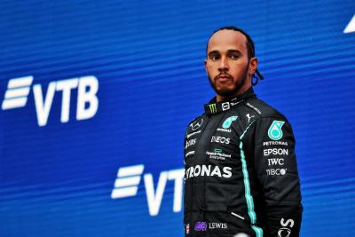 Race winner Lewis Hamilton (GBR) Mercedes AMG F1 celebrates on the podium.