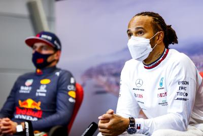 Lewis Hamilton (GBR) Mercedes AMG F1 and Max Verstappen (NLD) Red Bull Racing in the post race FIA Press Conference.