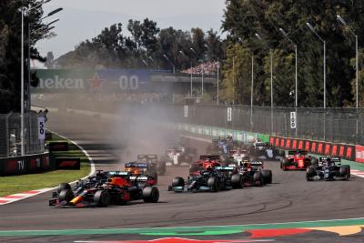 Max Verstappen (NLD) Red Bull Racing RB16B leads at the start of the race.