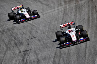 Nikita Mazepin (RUS) Haas F1 Team VF-21 leads team mate Mick Schumacher (GER) Haas VF-21.