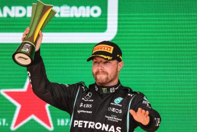 Valtteri Bottas (FIN) Mercedes AMG F1 celebrates his third position on the podium.