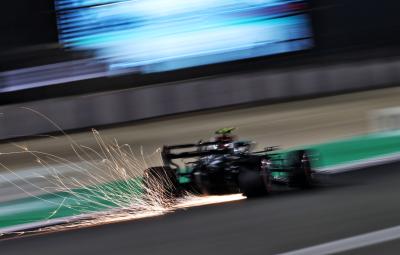 Valtteri Bottas (FIN) Mercedes AMG F1 W12 sends sparks flying.
