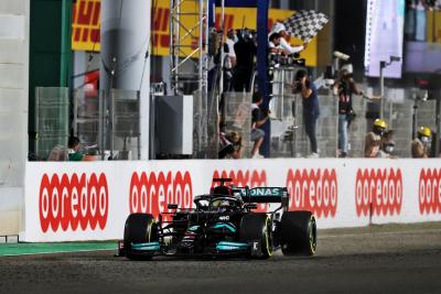 Race winner Lewis Hamilton (GBR) Mercedes AMG F1 W12 takes the chequered flag at the end of the race.