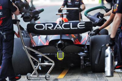 Max Verstappen (NLD) Red Bull Racing RB18 = rear wing.