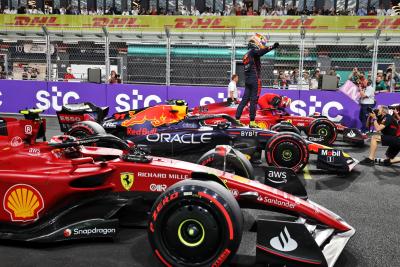 Sergio Perez (MEX) Red Bull Racing RB18 celebrates his pole position in qualifying parc ferme.