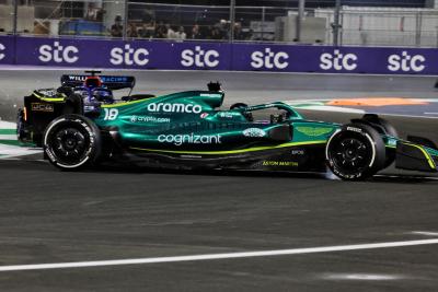 Lance Stroll (CDN) Aston Martin F1 Team AMR22 and Alexander Albon (THA) Williams Racing FW44 collide.