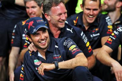 Sergio Perez (MEX) Red Bull Racing with Christian Horner (GBR) Red Bull Racing Team Principal.