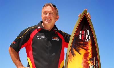 Ingall chasing Indy surfboard.