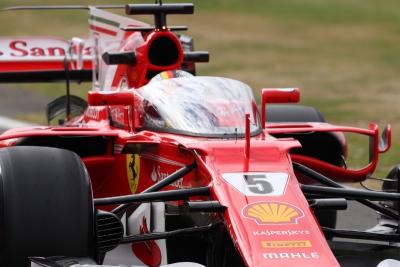 Sebastian Vettel and the Shield on his Ferrari SF70H