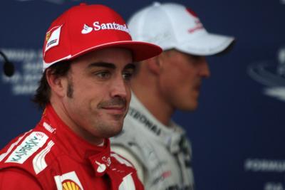 - Qualifying, Fernando Alonso (ESP) Scuderia Ferrari F2012 pole position and Michael Schumacher (GER) Mercedes AMG F1 W03