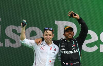Race winner Lewis Hamilton (GBR) Mercedes AMG F1 celebrates on the podium with Peter Bonnington (GBR) Mercedes AMG F1 Race