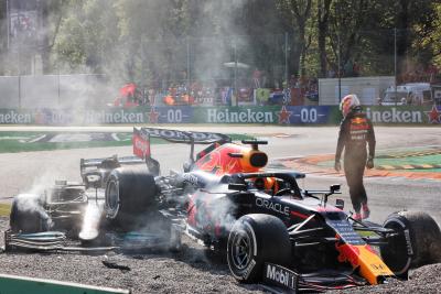 Max Verstappen (NLD) Red Bull Racing RB16B and Lewis Hamilton (GBR) Mercedes AMG F1 W12 crashed at the first